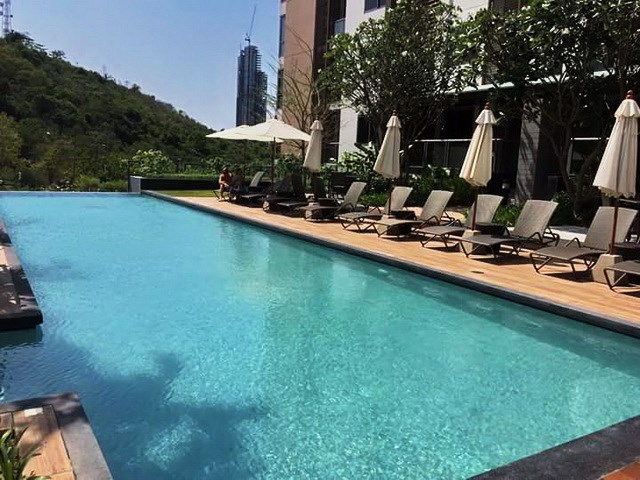 Condominium for sale UNIXX South Pattaya showing the communal swimming pool Condominium for sale UNIXX South Pattaya showing the communal swimming pool