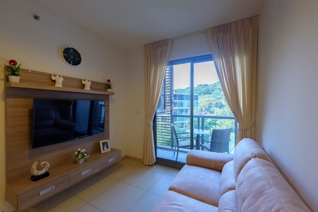 Condominium for rent UNIXX South Pattaya showing the living room and balcony Condominium for rent UNIXX South Pattaya showing the living room and balcony